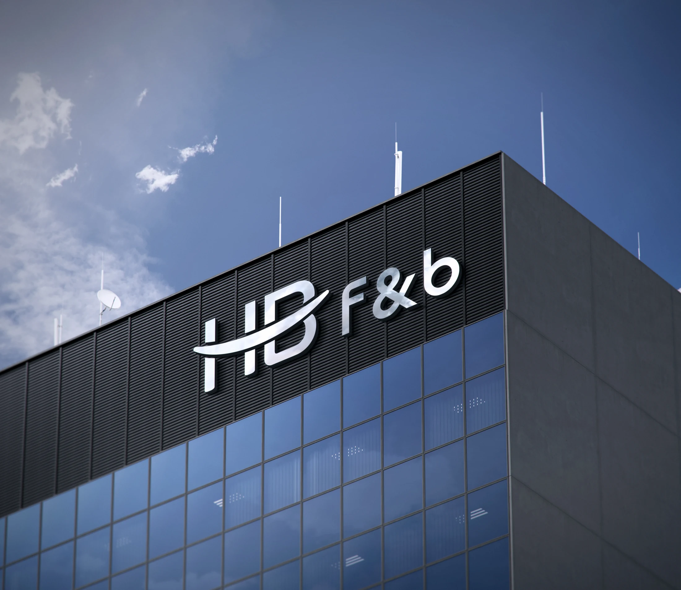 HB F&B 기업 로고가 적용된 건물 사인 목업